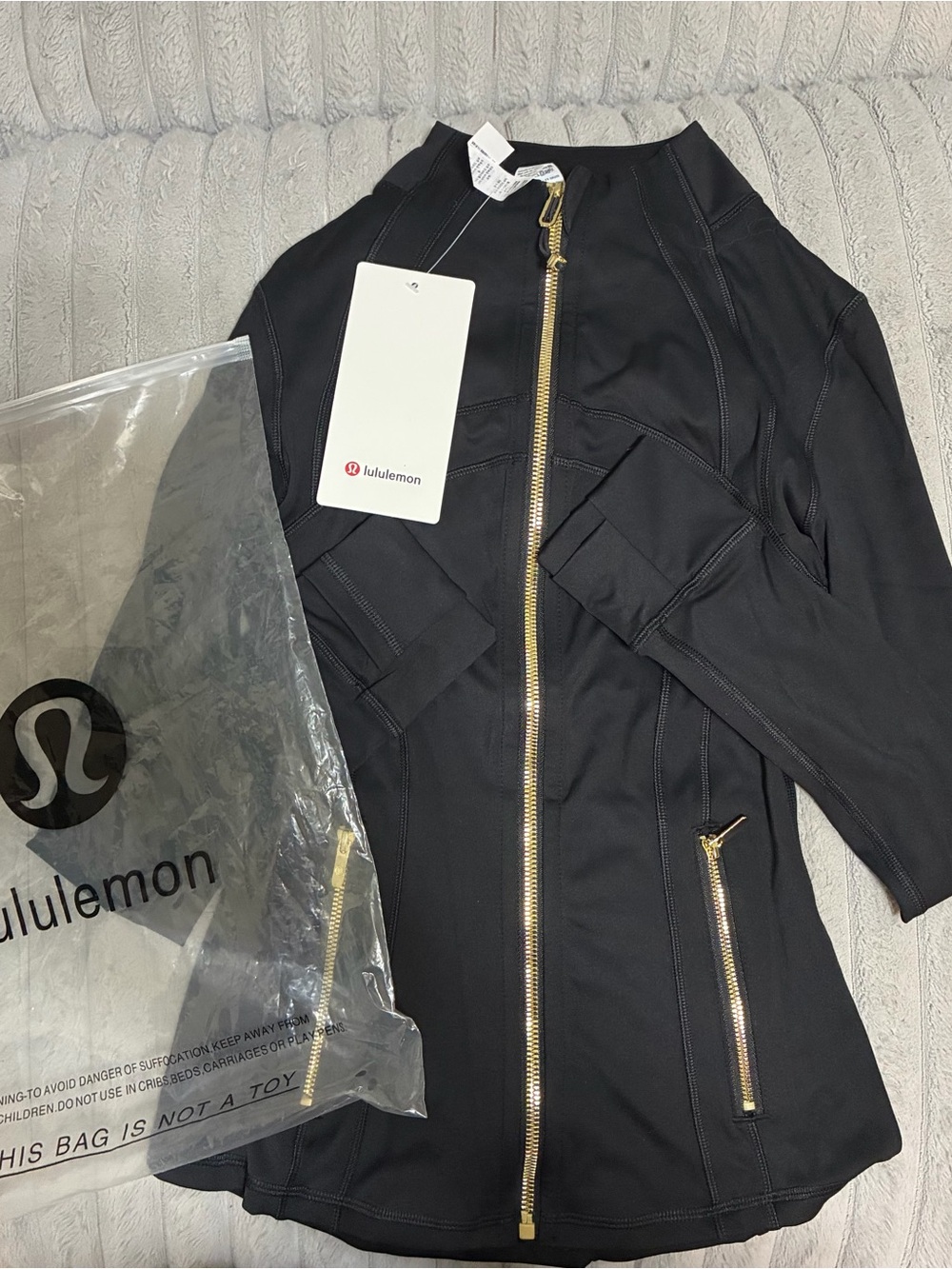 lululemon black jacket with gold zippers